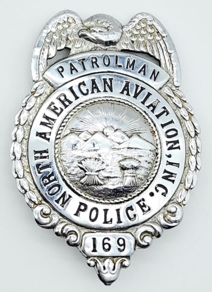 Obsolete North American Aviation Patrolman Badge: Obsolete North American Aviation Inc. Patrolman Police Badge #169. Badge is in nice condition with pin back, and is marked with the pattent number. Measures 2-5/8in.