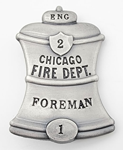 Obsolete Chicago Fire Dept Engine #2 Foreman Badge: Obsolete Chicago Fire Dept Engine #2 Foreman Badge #1. Badge is in nice condition and displays well with bell shape and has pin back and is marked Blackinton. Measures 2-1/4in.