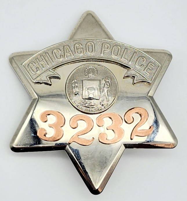 Obsolete Chicago Police Pie Plate Badge #3232: Obsolete Chicago Police Pie Plate Badge #1998. Badge is in nice condition with copper finish number, pin back, and is marked Blackinton. Measures 3-1/2in.