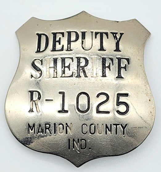 Obsolete Marion County Deputy Sheriff Badge: Obsolete Marion County Deputy Sheriff Badge #R-1025. Badge is in nice condition with some wear from age, pin back, and is marked with the pattent number. Measures 2in