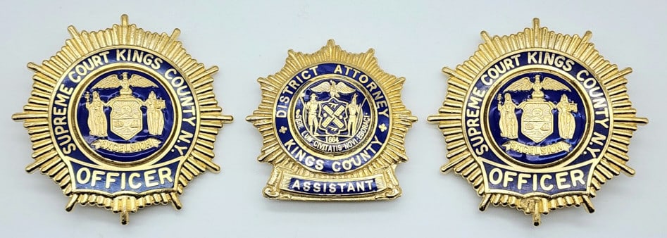 Obsolete Kings Co Supreme Court Officer Badges: Obsolete Kings Co New York Supreme Court Officer Badges. Badges are in very nice condition with blue enamel, pin backs, and are unmarked. Measures 2-1/4in.