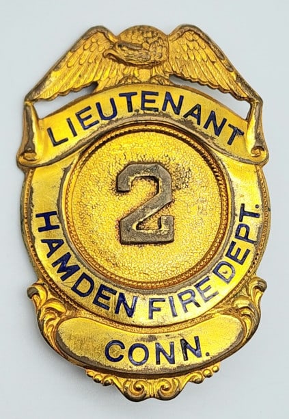 Obsolete Hamden Fire Dept Lieutenant Badge #2: Obsolete Hamden Fire Dept Lieutenant Badge #2. Badge is in nice condition with wear from use, pin back, and is unmarked. Measures 2-1/2in.