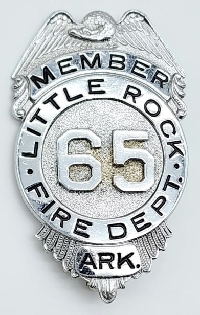 Obsolete Little Rock Arkansas Fire Dept Mem. Badge: Obsolete Little Rock Arkansas Fire Dept Mem. Badge. Badge is in nice condition with pin back and is unmarked. Measures 2-5/8in.