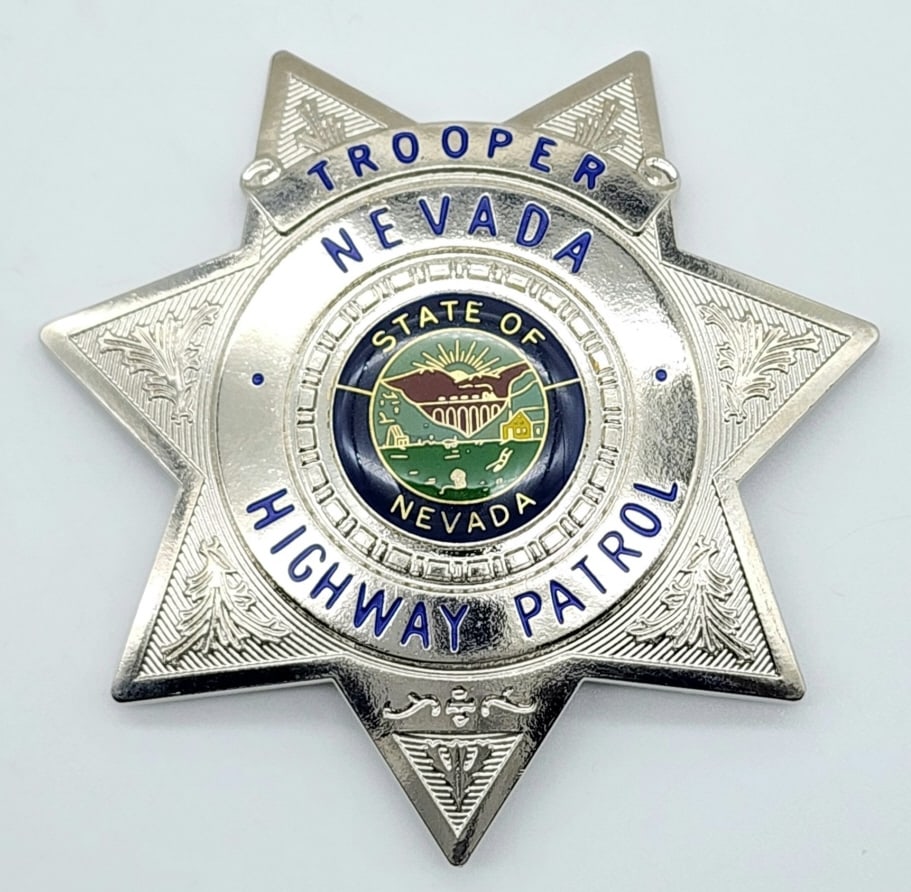 Repro. Nevada State Highway Patrol Trooper Badge: Repro. Nevada State Highway Patrol Trooper Badge w/ COA. Badge is in very nice condition with pin back and is marked with GODE makers marks. Measures 3-1/8in.