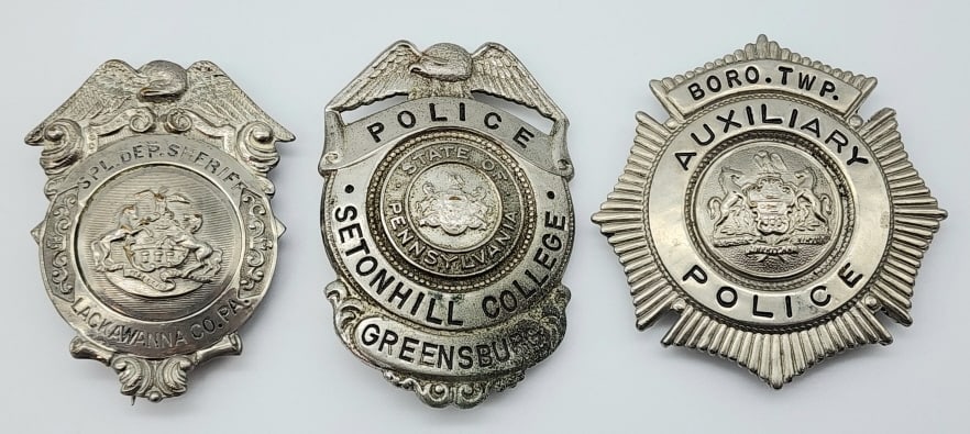 Obsolete Pennsylvania Police Badges: Obsolete Pennsylvania Police Badges. Badges include Boro Aux. Police, Setonhill college, and Lackawana Co. Special Deputy Sheriff. They are in nice condition with light wear from use, pin backs, and a