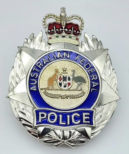 Obsolete Australian Federal Police Badge: Obsolete Australian Federal Police Badge. Badge is in very nice condition with a pin back and is unmarked. Measures 3-1/8in