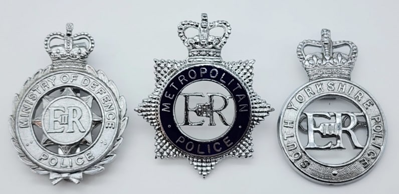 Obsolete British Police Hat Badges: Obsolete British Police Hat Badges. Badges are for the Ministry of Defence, South Yorkshire, and the Metropolitan Police. Badges are in very nice condition with pin backs and are unmarked. Measures 2i