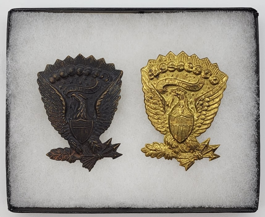 Civil War Jeff Davis Hat Sideplate Insignias: Civil War Jeff Davis Hat Sideplate Insignias w/ Case. Pieces are in very nice condition with nice patina and still retains the original loops and pins on the back. Approx measures 2-5/8in x 2in