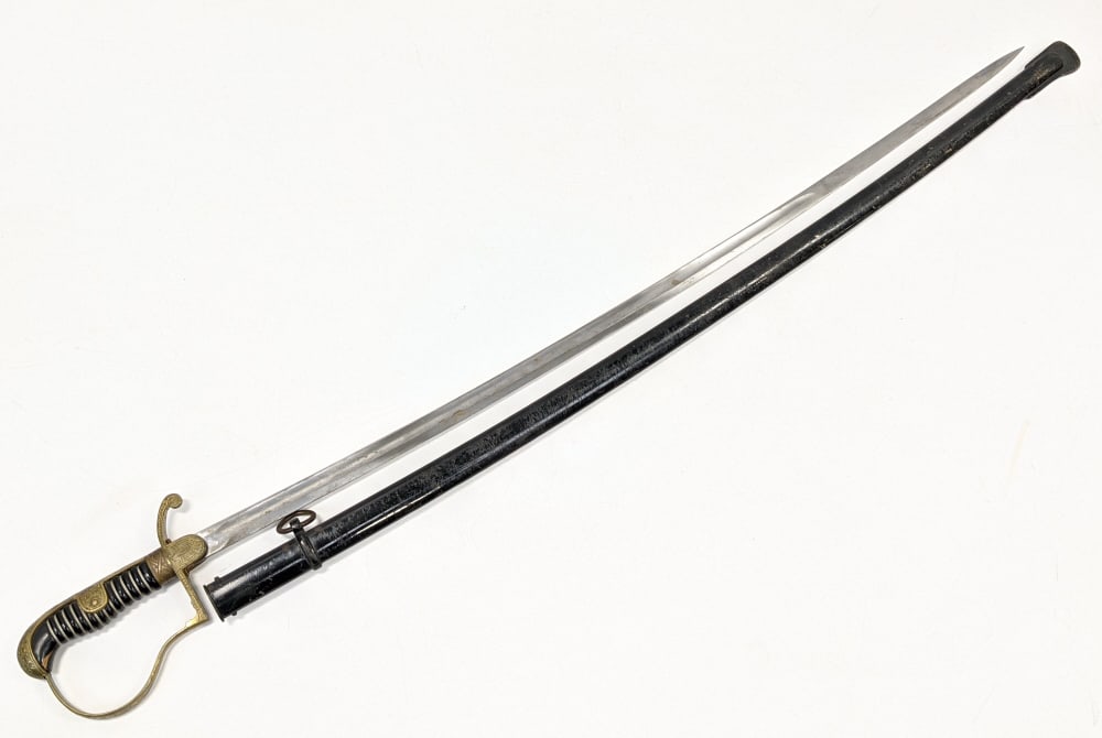 WW2 Era German Army Officers Sword & Scabbard: WW2 Era German Army Officers Sword & Scabbard by Robert Klaas Solingen. This saber is an 1889 Pattern dove?s head pattern sword and features a black composite grip with a wire wrap and brass engraved