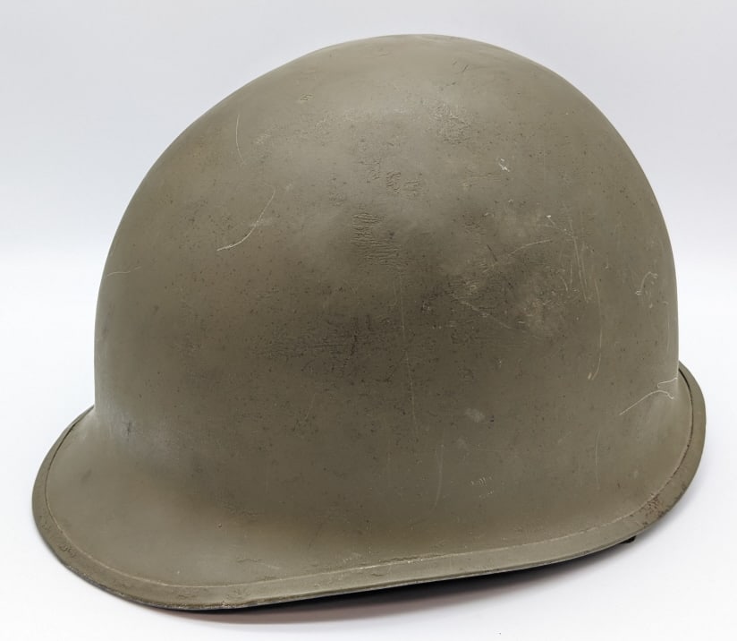 1966 Vietnam US M1 Military Helmet: 1966 Vietnam US M1 Military Helmet. Helmet is in very nice condition with both the fiberglass and canvas liner, and some scuffs from age and use.