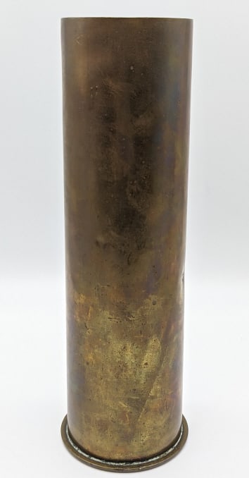 WW2 Era Artillery Shell Casing: WW2 Era Artillery Shell Casing. Case is in nice condition with markings on the bottom. Measures 11in tall.
