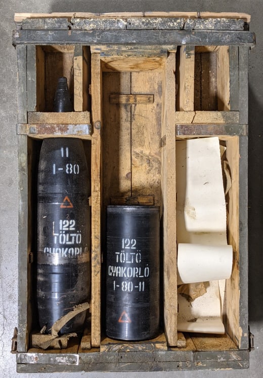 Russian 122mm Dummy Training Round in Crate: Russian 122mm Dummy Training Round in Crate. The round and casing features a black paint job with white writing and display nicely in the wooden military crate. Crate measures 29in long x 20in wide x 