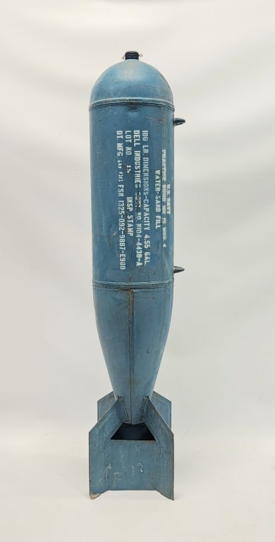 Vietnam Era US Navy MK15 100lbs Practice Bomb: Vietnam Era US Navy MK15 100lbs Practice Bomb. Bomb is in nice condition with expected surface rust from age, and displays well with blue paint and stencil writing. Measures 42in tall.