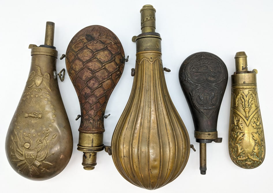 5) Early G&J.W. Hawksley & Unk Brass Powder Flasks: 5) Early G&J.W. Hawksley & Unk Brass Powder Flasks. The flasks are decorated with various line work and imagery. Largest measures 10-1/2in tall.