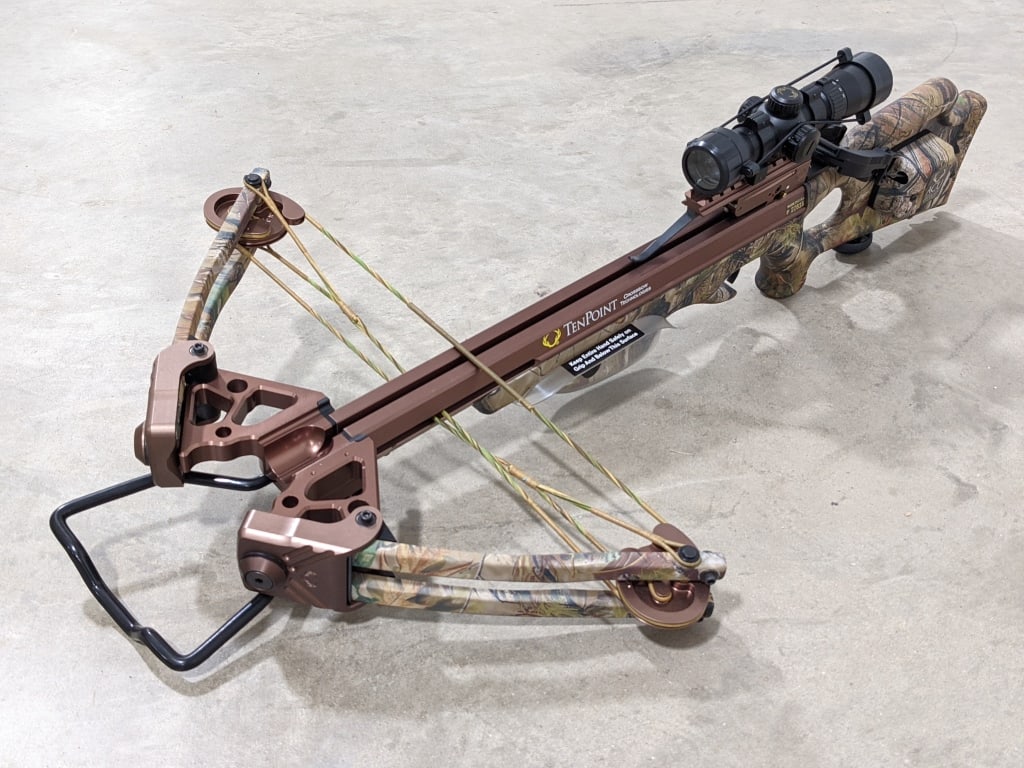 TenPoint Stealth XLT 185lbs Compound Crossbow: TenPoint Stealth XLT 185lbs Compound Crossbow. Crossbow features a rangemaster crossbow scope, short limbs for a compact size, 3.5lbs trigger pull, accudraw cocking mechanism, and comes with a camo ca