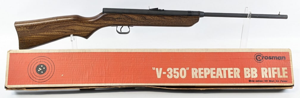 Crosman V-350 Repeater Slide Action BB Air Rifle: Crosman V-350 Repeater Slide Action BB Air Rifle w/ Box. Rifle is in very nice condition with some light finish wear from handling and age. Measures 34-1/2in long.