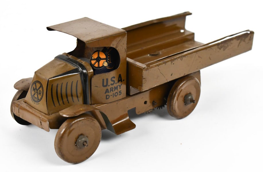 Marx Tin Windup Mack U.S.A. Army Truck: Marx tin windup Mack U.S.A. Army truck. The truck is missing the canvas bed tarp. Good condition with some scratches and wear from play / age. The windup mechanism works. Measures approximately 10" lo