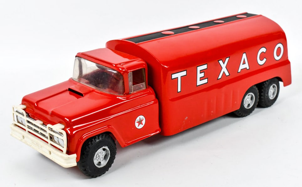 Custom Buddy L Texaco Tandem Axle Tanker Truck: Very nice custom Buddy L Texaco tandem axle tanker truck. The truck displays well with Texaco decals, front suspension, and a nice paint job. Good condition with some rub marks and light wear from dis