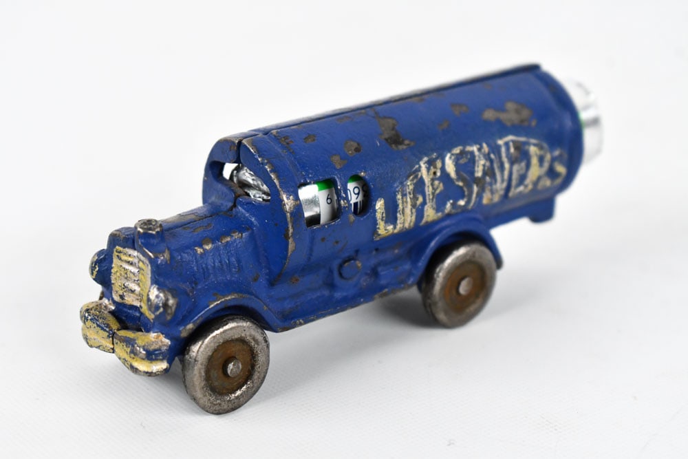 Contemporary Hubley Cast Iron Lifesaver Truck: Contemporary Hubley cast iron lifesaver truck. The truck has a date of 1988 embossed on the underside. Measures approximately 4" long without the candy.