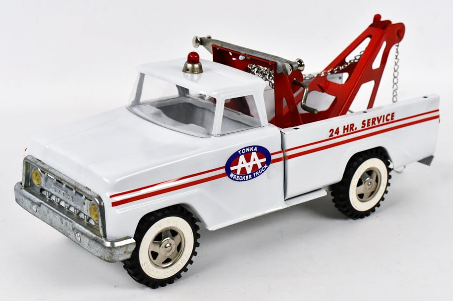 Custom Tonka AA Wrecker Tow Truck: Custom Tonka AA wrecker tow truck. Good condition with light wear from display. Measures approximately 14" long.