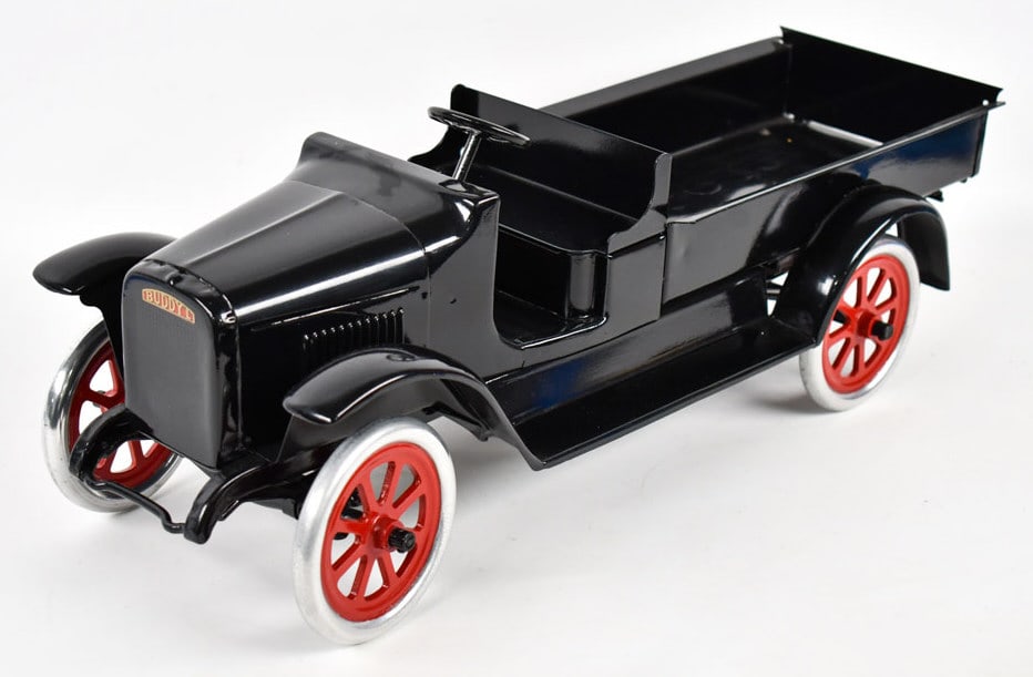 Restored Buddy L Express Truck: Restored Buddy L Express truck. Displays well with open cab, spoked wheels, and painted in black overall. Good condition with light wear from display. Measures approximately 24" long.