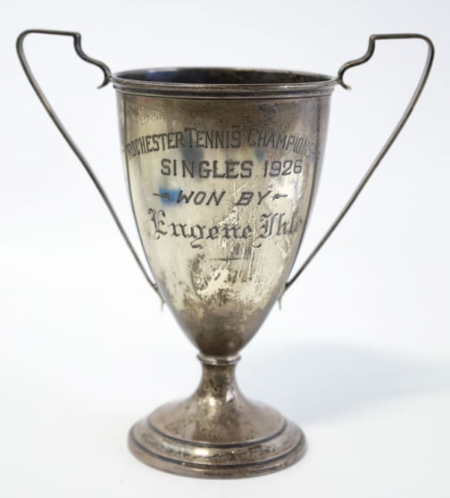 1926 Sterling Rochester Tennis Champion Loving Cup: 1926 sterling silver Rochester Tennis Championship Singles Champion loving cup presented to Eugene Uhle. The loving cup in nicely inscribed and measures approx. 6.75" tall x 6.5" across overall. Weigh