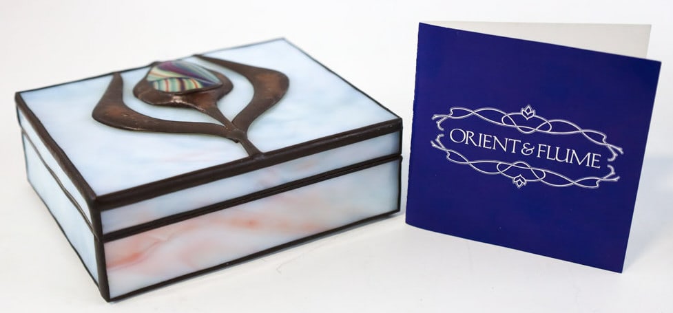 Orient & Flume Lotus On Sheet Glass Lidded Box: Very nice Orient & Flume Lotus on rose streaked hand-rolled sheet glass hinged box. The box is registration # B1977 M 84 and comes with the COA. Measures 2" tall x 5" across x 4" deep and is in great