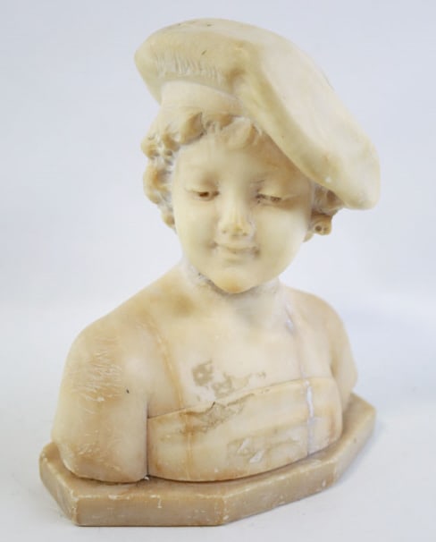 Antique Alabaster Bust Of A Young Mother: Antique Alabaster Bust featuring a young girl. The bust is in fair condition with some edge dings and has been repaired. Measures 9-1/4" tall x 7-3/4" across.