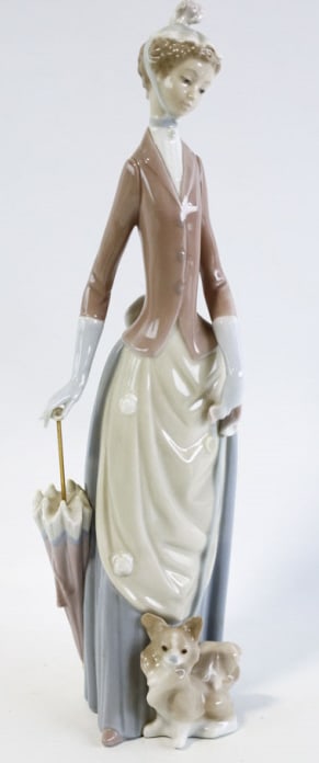 Lladro "Woman With Dog" Porcelain Figirine #4761: The retired figurine measures 14" tall and is in mint condition.