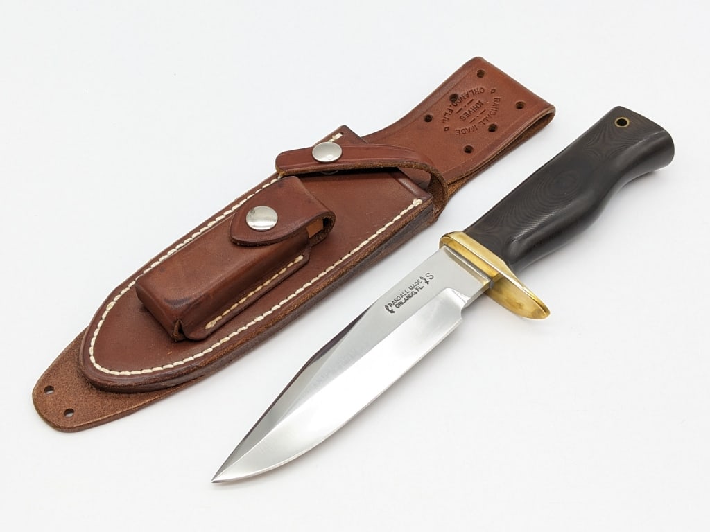 Randall Made Model 15 Stainless Steel Airman Knife: Randall Made Model 15 Stainless Steel Airman Knife w/ Randall Sheath. Knife features stainless steel blade, brass single hilt, and full tang handle with black micarta and wrist thong hole. Knife is in