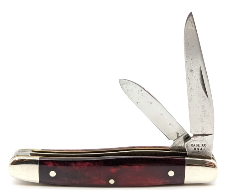 1979 Case XX Red Appaloosa Bone Jack Knife SP62027: 1979 Case XX Red Appaloosa Bone Jack Knife SP62027. Knife is in nice condition with some wear on the bolsters from handling, and some traces of pitting on the blades. Measures 3in when closed.