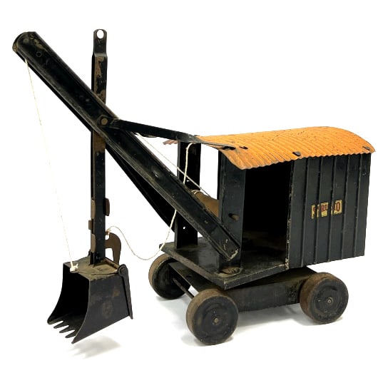 Original 1930's Structo Steam Shovel Steel Toy: Original 1930's Structo Steam Shovel Pressed Steel Toy. This toy is structurally in good condition rolling and turing freely, and shovel lift working. It does show its age and wear with scratches, mis