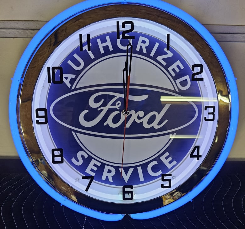 Custom Ford Neon Clock: Custom Ford neon clock. Nice condition with light wear from storage. It measures approximately 18" in diameter.