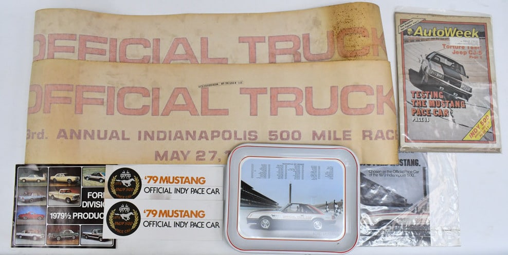 1979 Official Truck Indy 500 Decals & Pace Car Adv: 1979 Official Truck Indy 500 decals and 1979 Ford Mustang pace car advertising. The decals are unused, but do have some staining / water damage. Includes 1979-1/2 Ford Division catalog, 1979 AutoWeek 