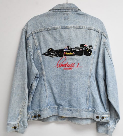 Mario Andretti Denim Jacket: Mario Andretti Denim Jacket with a race car on the back. The tag is marked LEE size Large.REF#BWS1008