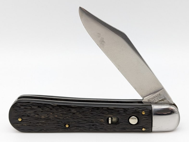 Schrade Cut Co Plastic Auto Switchblade Knife: Schrade Cut Co Plastic Auto Switchblade Knife. Knife is in nice condition with some pitting and sharpening marks and polished bolsters. Blade has a strong spring and has a little bit of play when open