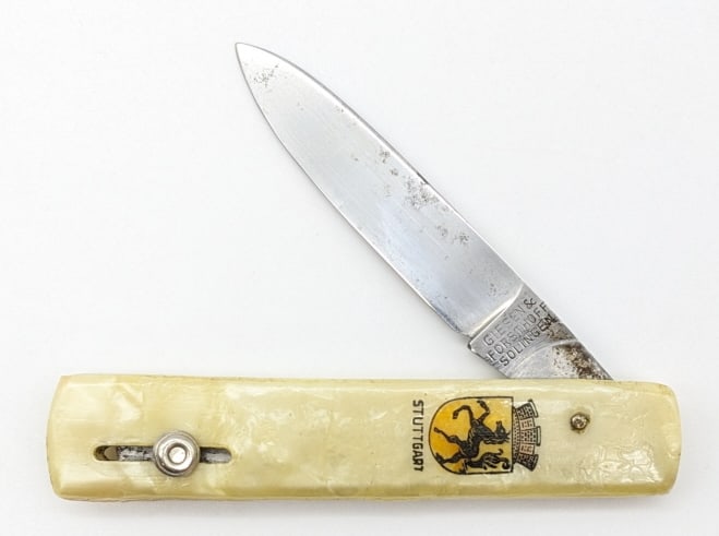 Giesen & Forsthoff Stuttgart Assisted Open Knife: Giesen & Forsthoff Stuttgart Assisted Open Knife. Knife features a pull switch that folds out the knife as it comes down. Knife is in nice condition with carbon spotting on the blade and branding on t