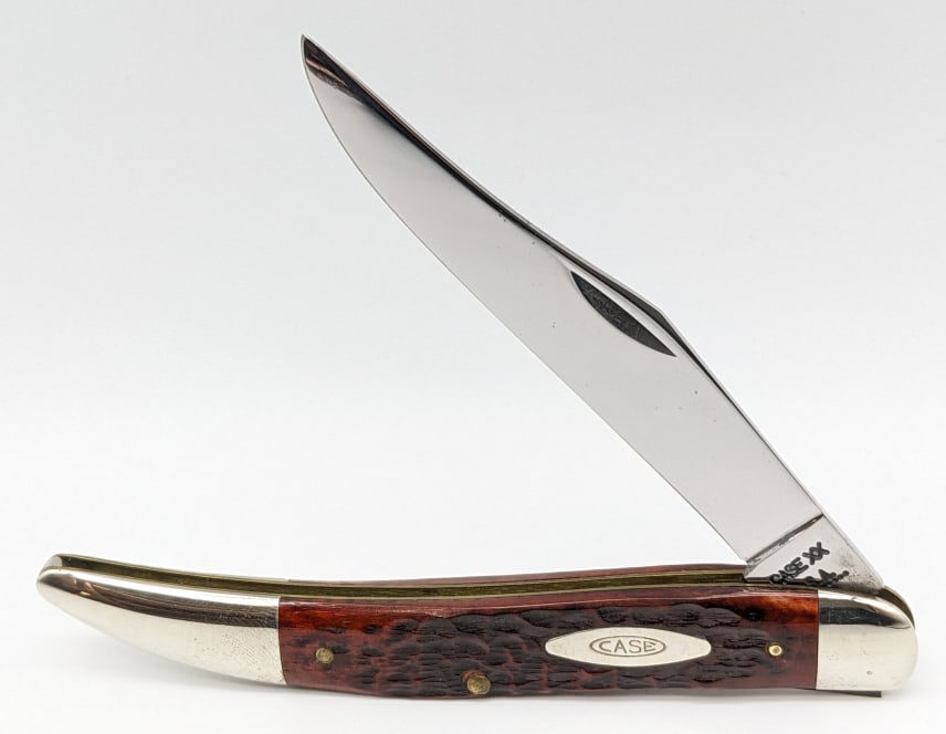 1971 Case XX Red Bone Large Toothpick 61093: 1971 Case XX Red Bone Large Toothpick 61093. Knife is in nice condition with a spot of corrosion on the leaf spring. Overall length of 5in when closed.
