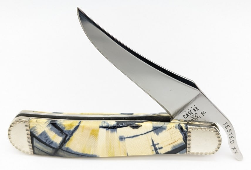 2021 Case XX Painted Pony Mammoth Tooth Russlock: 2021 Case XX Painted Pony Mammoth Tooth Russlock w/ Box by Michael Prater. Features dimpled bolsters, mammoth tooth handle scales, and series info etched on the back side of the blade. Knife is in lik