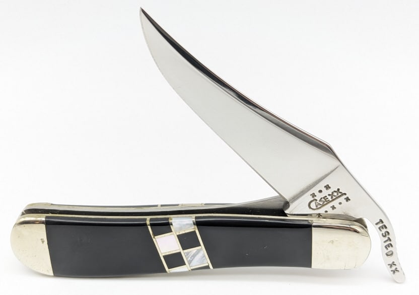 2002 Case XX Exotic Russlock EX1953L w/ Box: 2002 Case XX Exotic Russlock EX1953L w/ Box. Features slick black and checkered mother of pearl handle scales. Knife is in very nice condition with some light wear on the bolsters from handling. Overa