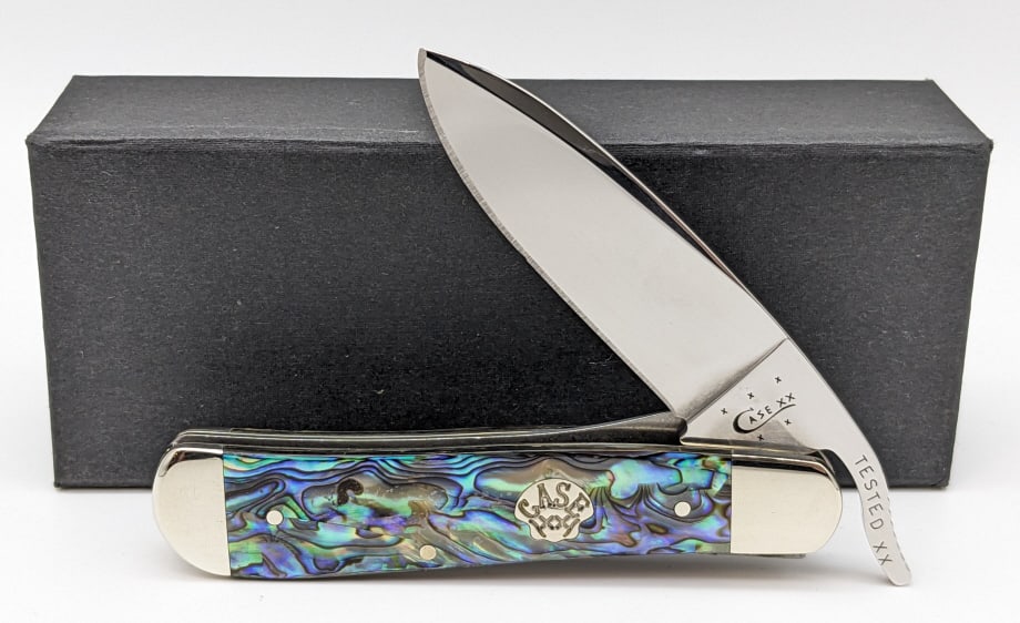 2015 Case XX Paua Abalone Drop Point Russlock: 2015 Case XX Paua Abalone Drop Point Russlock 81953 1/2L w/ Box. Knife is in new condition. Overall length of 4-1/8in when closed.