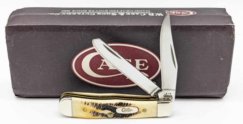 2004 Case XX Bone Stag Tiny Trapper Knife w/ Tin: 2004 Case XX Bone Stag Tiny Trapper Knife 6.52154 w/ Tin. Knife is in new condition. Overall length of 2-1/2in when closed.