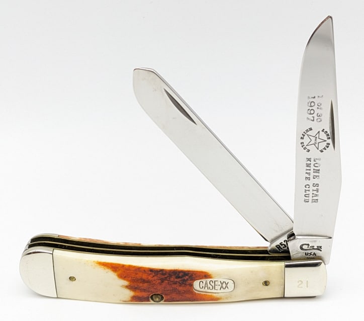 1996 Case XX Red Stag Lone Star Knife Club Trapper: 1996 Case XX Red Stag Lone Star Knife Club Trapper R5254 1 of 30. The main blade in engraved with "Lone Star Knife Club", and the upper front bolster is stamped with the serial number 21. Knife is in