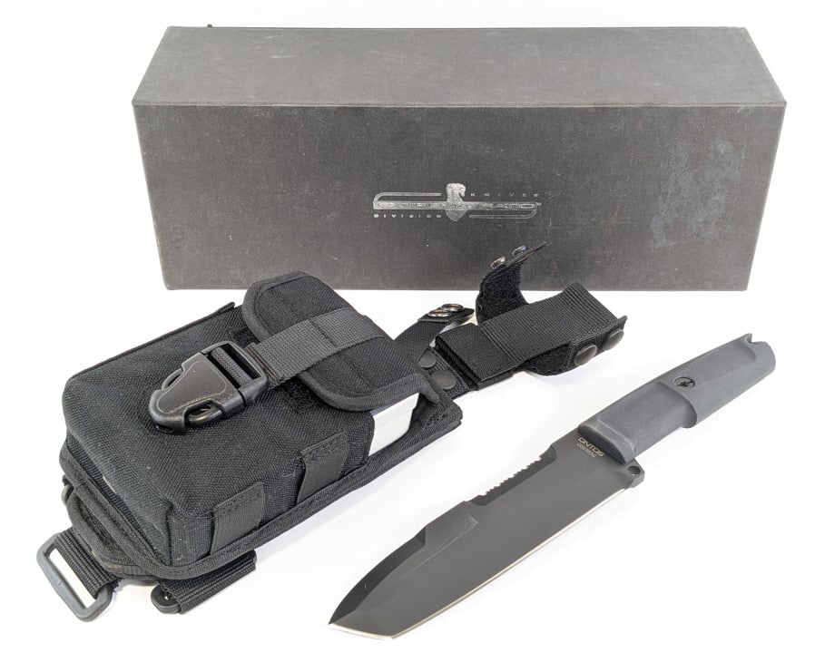 NIB Extrema Ratio Ontos Survival Knife w/ Sheath: NIB Extrema Ratio Ontos Survival Knife w/ Sheath & Survival Kit. Features a black finish modified tanto blade with a serrated spine, and Forprene rubber handle with lanyard hole. Also comes with a sur