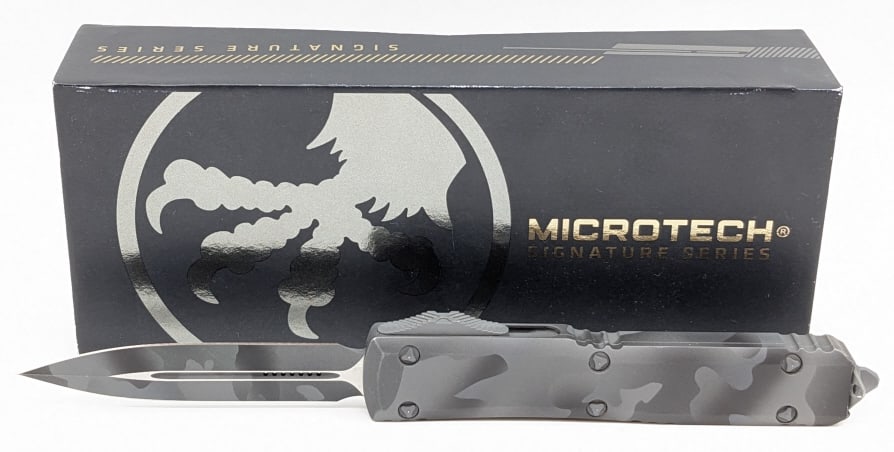 NIB Microtech Signature Series Ultratech D/E OTF: NIB Microtech Signature Series Ultratech D/E Urban Camo OTF Knife. Knife is in new condition. Overall length of 5in when closed.