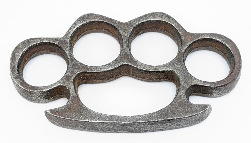 Vintage Chunky Brass Knuckle Dusters: Vintage Chunky Brass Knuckle Dusters. Knuckles are in nice condition with some wear from age and casting pits. Measures 4-1/2in across. Please check your local laws before bidding. We will not ship to