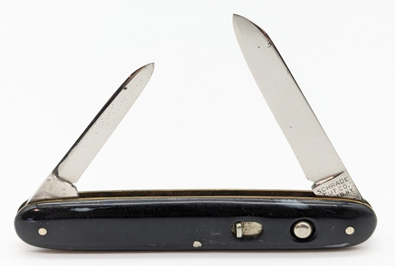 Vtg Schrade Cut Co 2 Blade Switchblade Knife: Vtg Schrade Cut Co 2 Blade Switchblade Knife. Knife is in nice condition with polished blades, and marbled black plastic handle scales. Both blade springs are strong. Overall length of 3-3/8in when cl