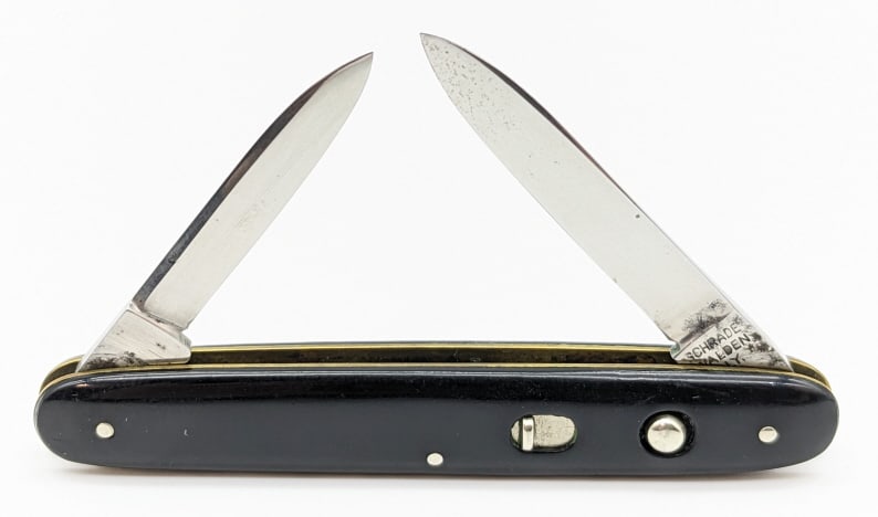 Vtg Schrade Walden 2 Blade Switchblade Knife: Vtg Schrade Walden 2 Blade Switchblade Knife. Knife is in nice condition with polished blades, and slick black plastic handle scales. Both blade springs arent strong enough to open all the way, and th