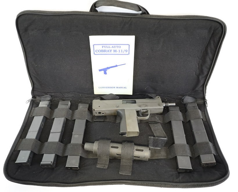 Cobray M-11 9mm Semi Auto Pistol MAC-11 Clone: Cobray M-11 9mm Semi Auto Pistol MAC-11 Clone. Comes with five magazines and heat shield barrel shroud. Features a 5-1/2in barrel and parkerized finish. Pistol is in very nice condition with minimal w