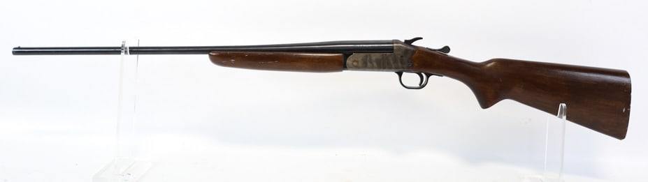 Sears Model 101.10041 Single Shot .410 Ga Shotgun: Sears Model 101.10041 Single Shot .410 Ga Shotgun. Features 26in blued finish barrel, color case hardened receiver, and smooth wood stock missing the butt pad. Shotgun is in used condition with scuffs